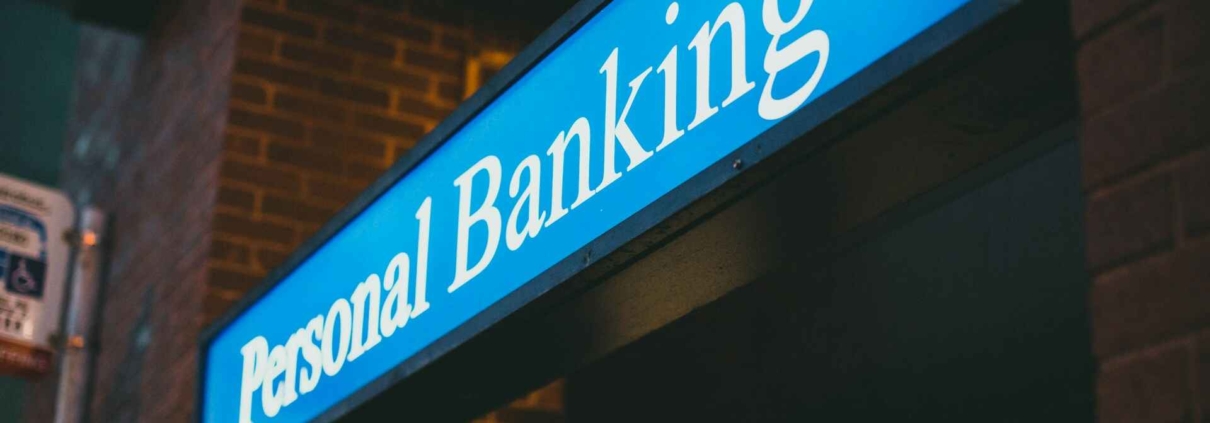 Personal banking signage overlooking a street