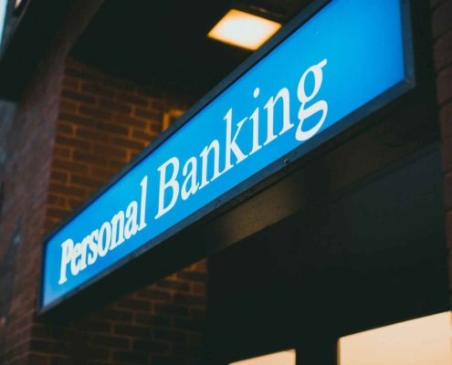 Personal banking signage overlooking a street
